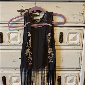 Long fringed vest